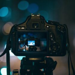 Capture stunning images with this DSLR camera featuring bokeh lights in the background. Perfect for photographing moments at Pennsylvania wedding expos and bridal shows.