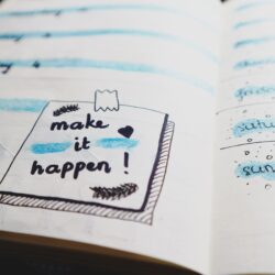 A notebook with the words "make it happen" written on it is a must-have for anyone attending Pennsylvania bridal shows or the Pennsylvania wedding expo.